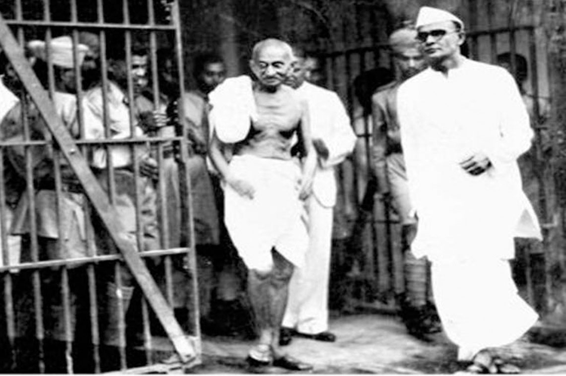 Mahatma Gandhi along with Dr H.K Mahtab behind Mahatma Gandhi coming out of jail