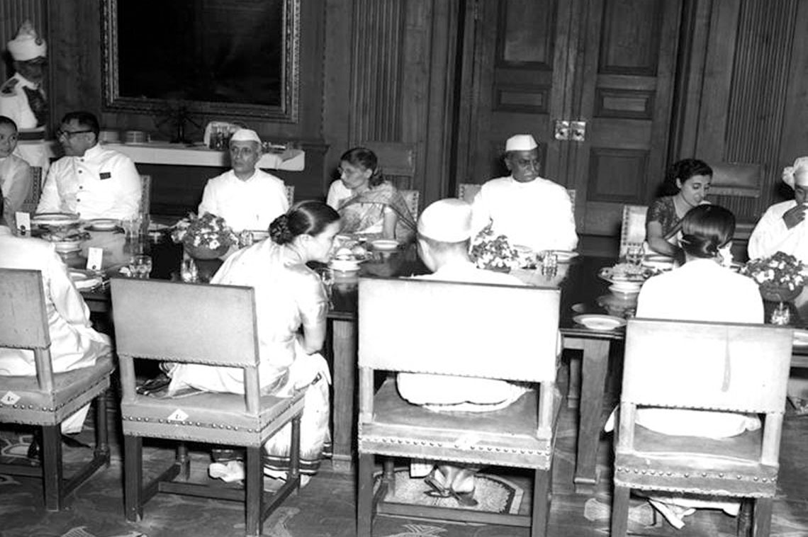 A general view of the lunch given by the President, Dr. Rajendra Prasad, in honour of the Prime Minister of Burma, Thakin Nu, at Rasthrapathi Bhawan, New Delhi, on October 22, 1951. Among others in the picture appears: Shri Jawaharlal Nehru, Prime Minister; Dr H.K. Mahtab, Commerce and Industry Minister Govt. of India; Shrimati Lilavati Munshi; Shrimati Indira Gandhi; Shrimati K.P.S. Menon; H.E. the Burmese Ambassador; and his wife. 