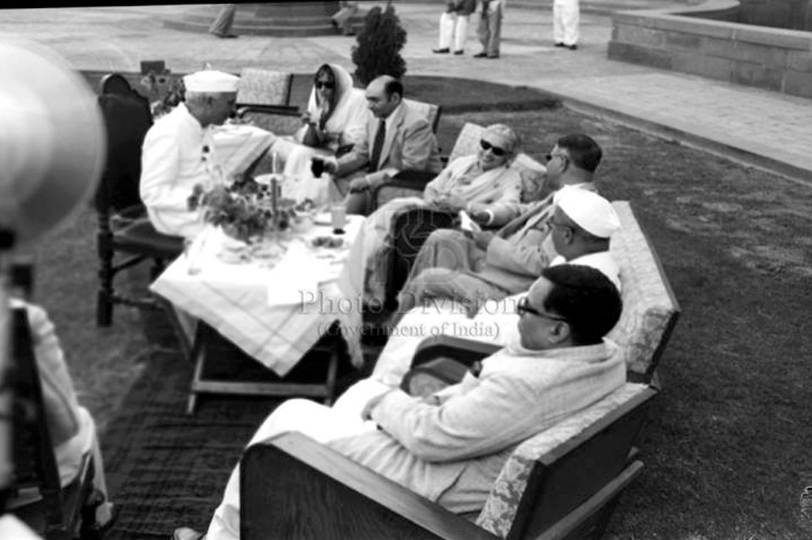 H.R.h. Marshal Shah Mahmoud Khan, Prime Minister of Afghanistan, at Parliament House, New Delhi on September 5, 1951. Photo shows a view of the party. (L. to R.): Shri Jawaharlal Nehru, Prime Minister; Rajkumari Amrit Kaur, Dr. H.L. Keenleyside, U.N. Director of Technical Assistance Administration,Health Minister; H.E. Dr. Najibullah Khan, Afghan Ambassador in India; shrimati Vijayalakshmi, Indian Ambassador to USA; H.R.H. the Prime Minister of Afghanistan; Shri Ananthasayanam Ayyangar Deputy Speaker, Parliament of India and Dr H.K. Mahtab, Minister for Commerce and Industry, Government of India.  