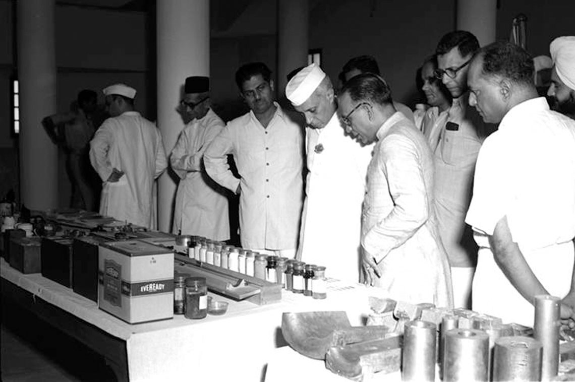 The Hon ble Shri Jawaharlal Nehru, Prime Minister along with Shri H.K Mahtab Union Industry Minister Govt. of India, visited the Indian Standards Institutions, on August 9, 1951. Photo shows him going round the laboratory of the Institution, during his visit.